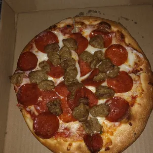 Here's my pepperoni and sausage personally pizza. Is great, but could of add a little more sauce.