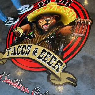 a man in a so cal tacos hat