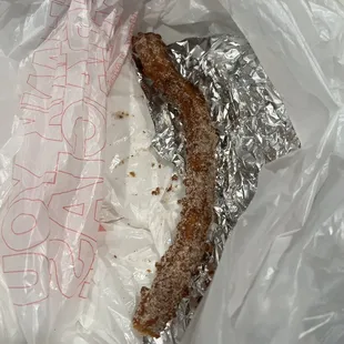 Burned churro.
