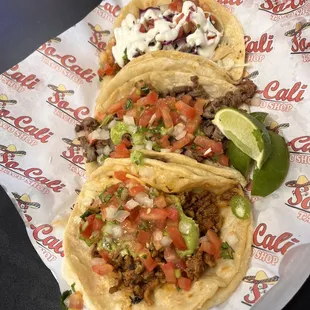 three tacos on paper