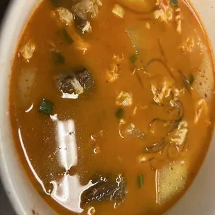 Spicy kalbi tang. (Looks a little murky after I mixed in the raw egg)