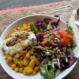 I eat here a few times a week and love the good karma bowl!