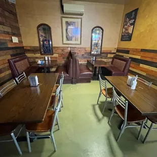 a restaurant with tables and benches