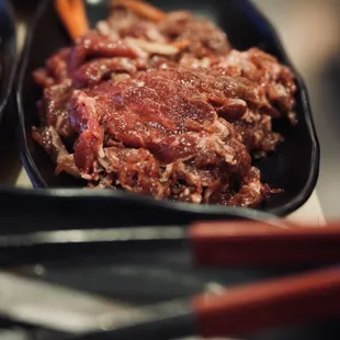 a plate of meat and vegetables