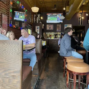 people sitting at the bar