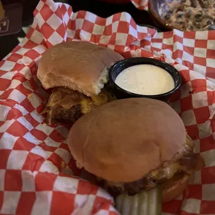 Two sliders with American cheese and ranch