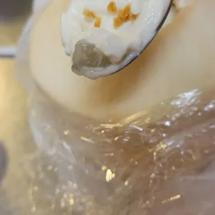 Coconut Pudding. Jelly layer on bottom topped with toasted coconut. Soooo good.