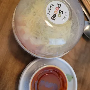 Spicy pork bowl, miso soup and sauce for bowl