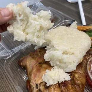 Dry old rotten chicken and half cook Sticky Rice