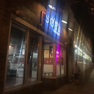 a neon sign for soba