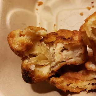 Raw wanton, that is the result of not knowing how to properly make Crab Rangoon