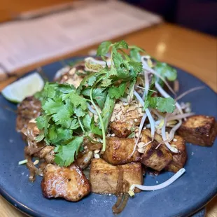 Pad Thai - rice noodles, chicken, shrimp, tofu, peanuts, mung bean sprouts, cilantro