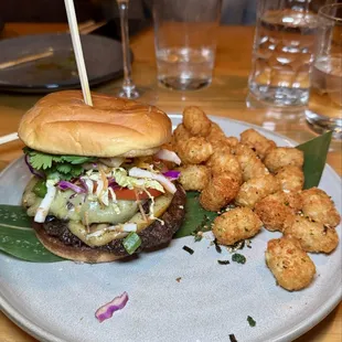 Wok Smashburger - two four ounce patties, smoked gouda, crispy chili aioli, napa cabbage slaw, tomato, cilantro, caramelized onions