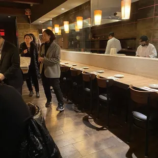 a group of people in a restaurant