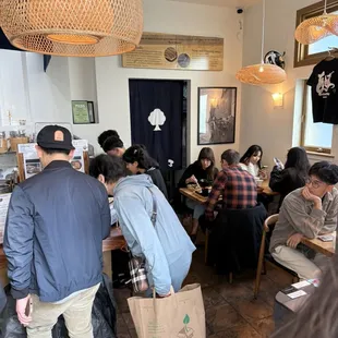 11 seats (2 tables of 4 and 3 counter seats)