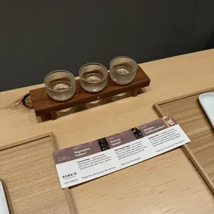 Sake flight with description.