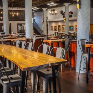 a wooden table and chairs