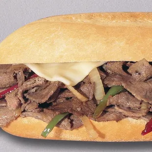 a beef sandwich with peppers and cheese
