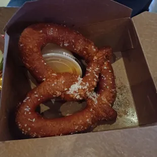 Pretzel and cheese sauce