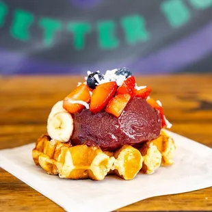 a waffle with fruit on top