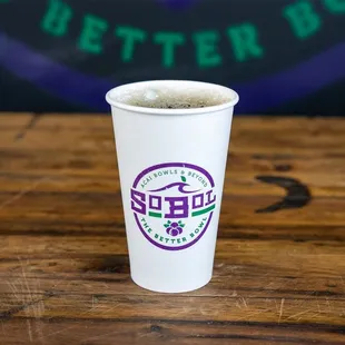 a cup of coffee on a table