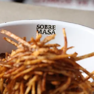 a bowl of french fries