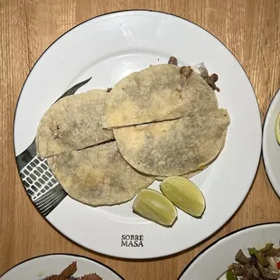 three plates of mexican food