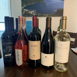 a variety of wines on a table