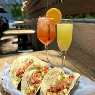 three tacos and a drink