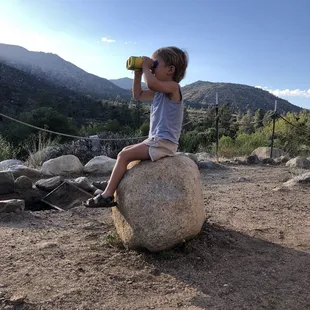 A tiny explorer enjoying the campsite