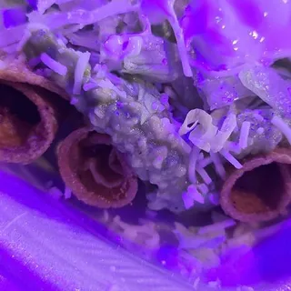 3 rolled tacos