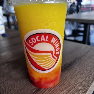 a cold drink in a plastic cup