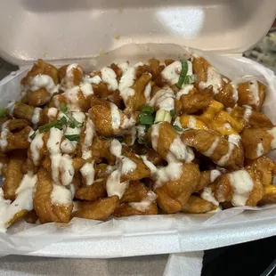 Small So Cal fries that looked so delicious until I started grubbing and discovered old fries underneath.