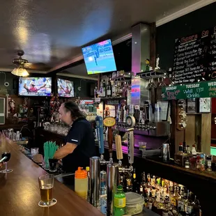 a man and a woman at the bar