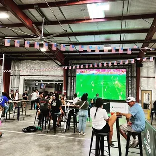 Between the indoor soccer fields.