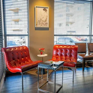 red leather chairs and a table