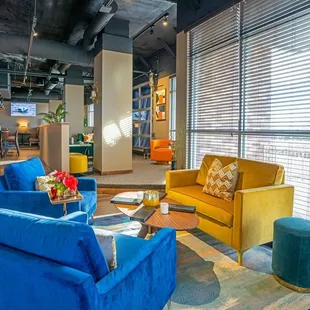 blue chairs and a yellow couch