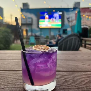 Enjoy craft cocktails outside in out garden all while watching your favorite sports on the largest screen in Midtown!