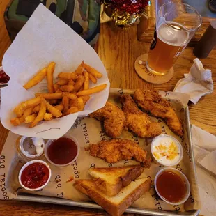 Chicken tendies, salt and vinegar fries and sauce!