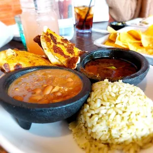 Quesabirria tacos - comes with fluffy cilantro rice and flavorful charro beans