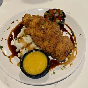 Organic fried garlic chicken with mashed potatoes.