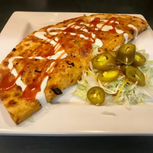 two slices of pizza on a plate