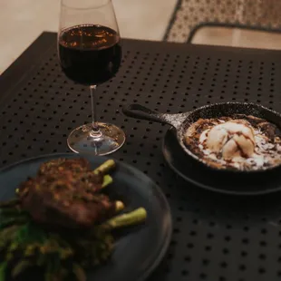 What a perfect meal. A ribeye with a red wine, and pizookie!