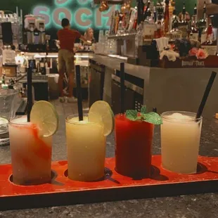 Frozen Flight! Two swirl margaritas, peach Bellini and the wild berry mojito (my favorite)