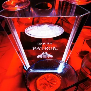 a glass of patron