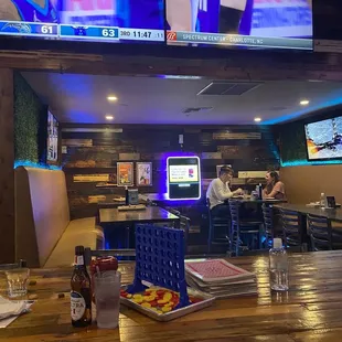 a bar with a television screen