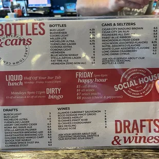 a hand holding a menu