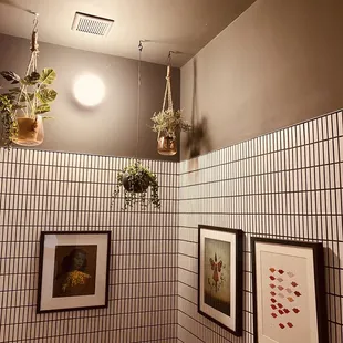 a bathroom with tiled walls