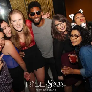 a group of people posing for a picture