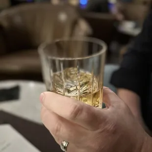 Whiskey on a large rock.